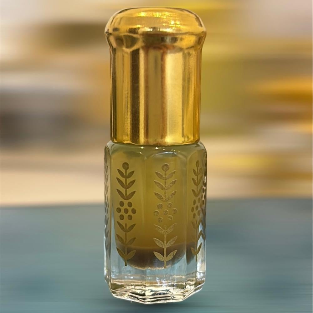 A traditional glass bottle containing golden Bilisan oil